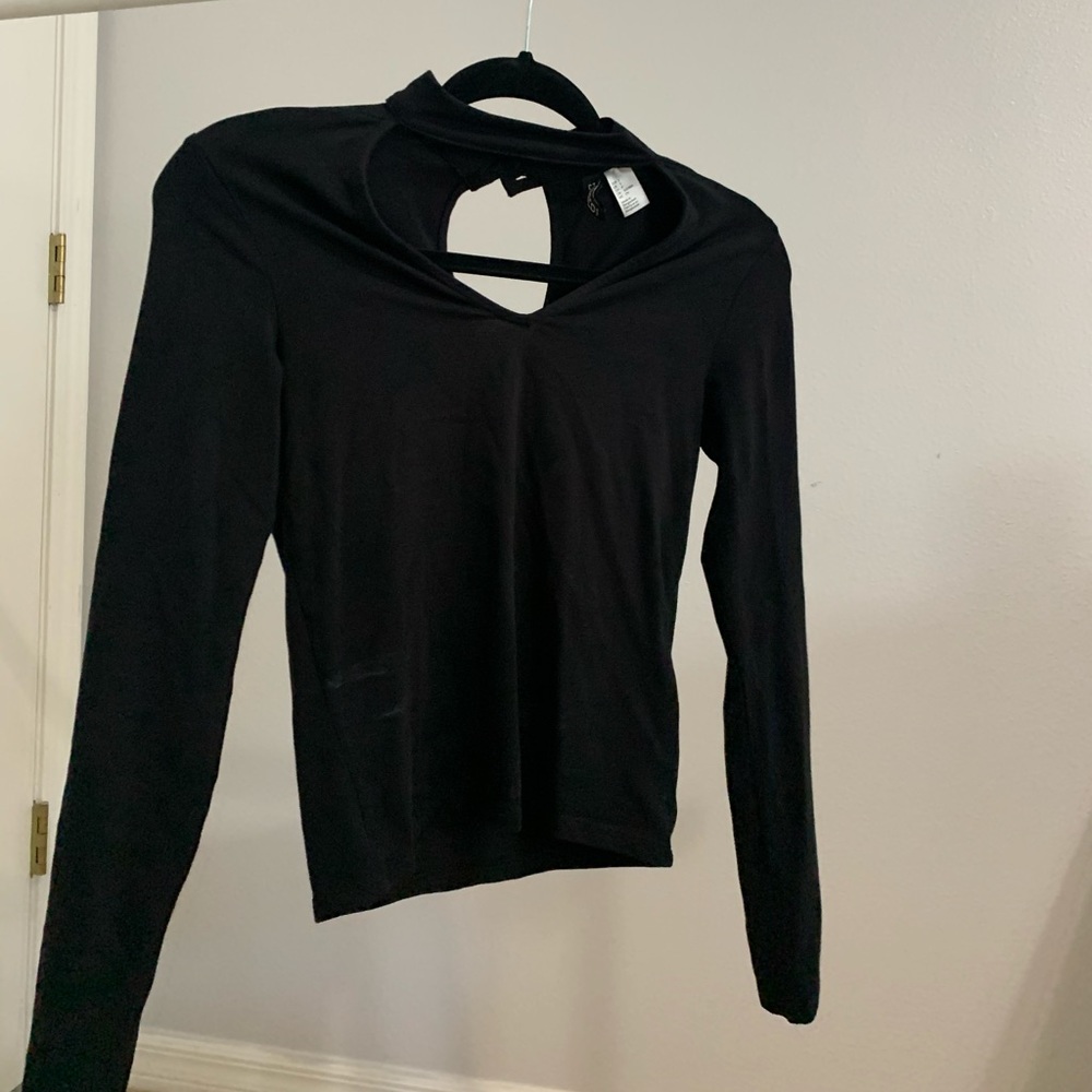 Black Long Sleeve with front and back opening.